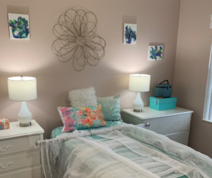 With simple white lamps and a twin bed, we transformed a very small bedroom into a teenagers delight. 